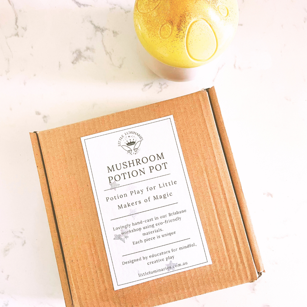 Box labeled 'Mushroom Potion Pot' on a marble surface with a yellow object in the background