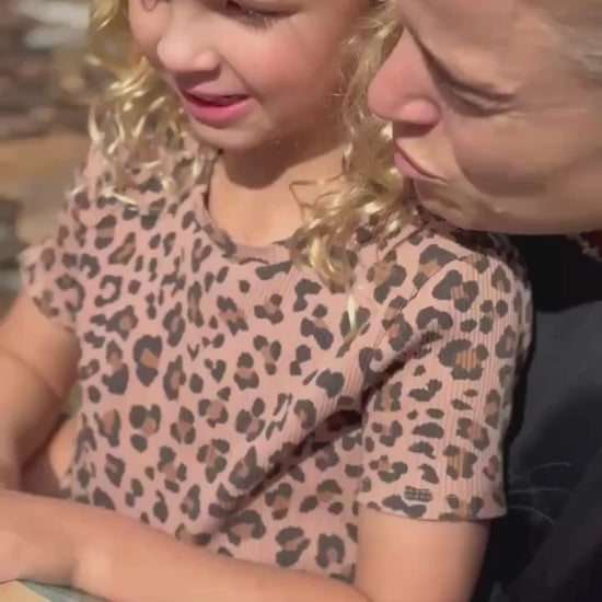 mother and daughter reading mystical mail together
