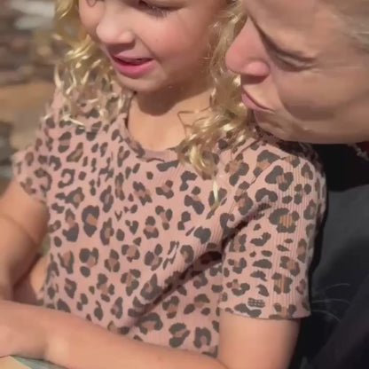 mother and daughter reading mystical mail together