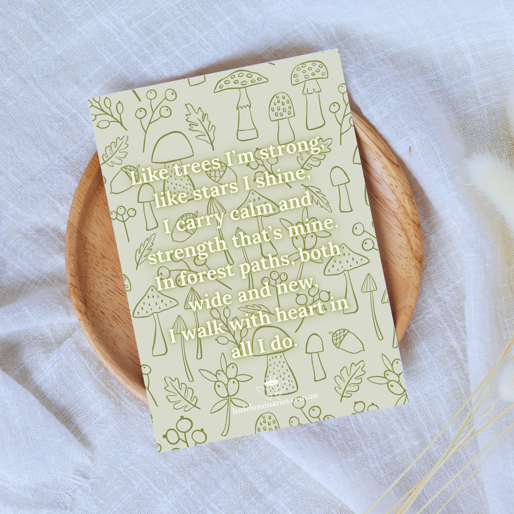Notebook with nature-themed design and text on a wooden plate