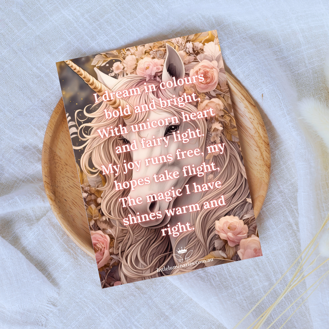 Card with unicorn design and text on a light blue fabric background