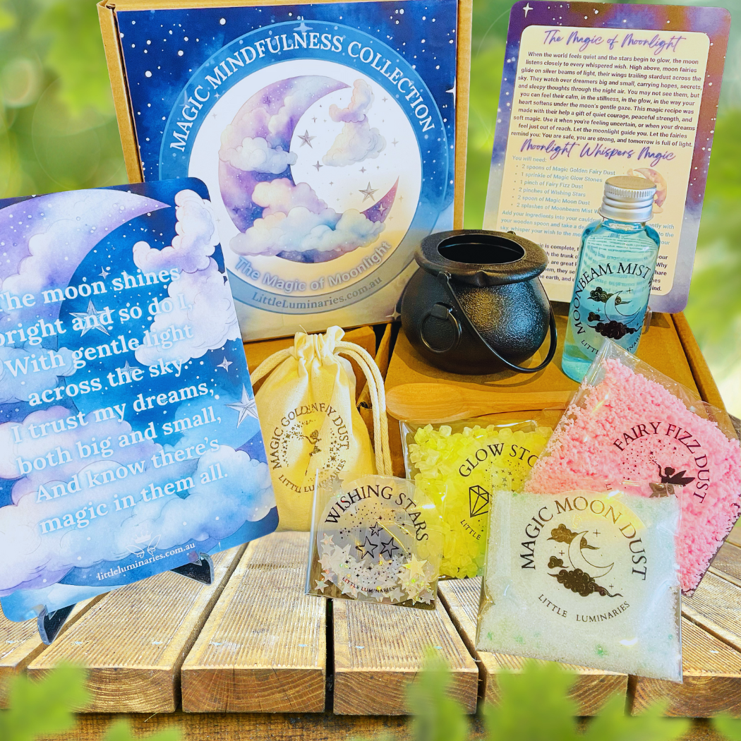 Magic Mindfulness Collection with various items on a wooden surface outdoors