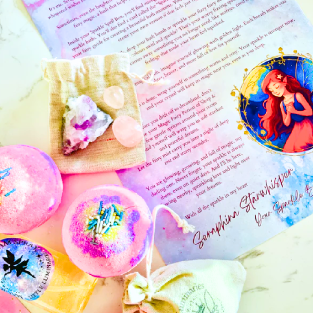 Colorful bath bombs with a fairy-themed card and shell decoration.